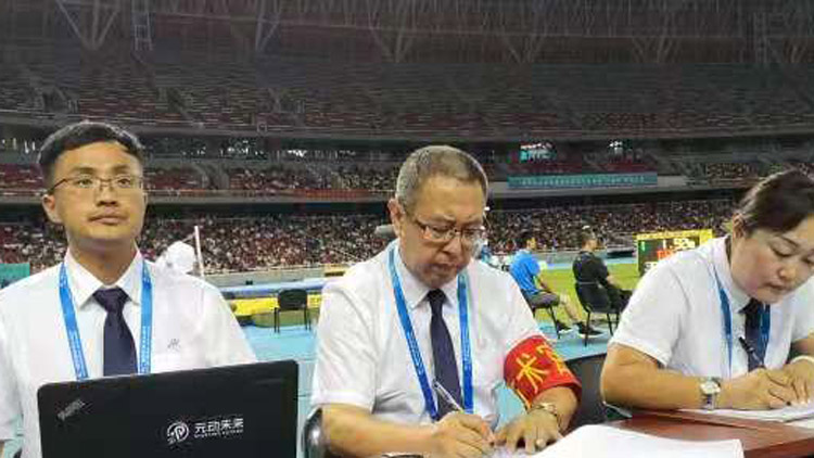 我校九三学社社员林松、李寅执裁中华人民共和国第二届青年运动会田径比赛